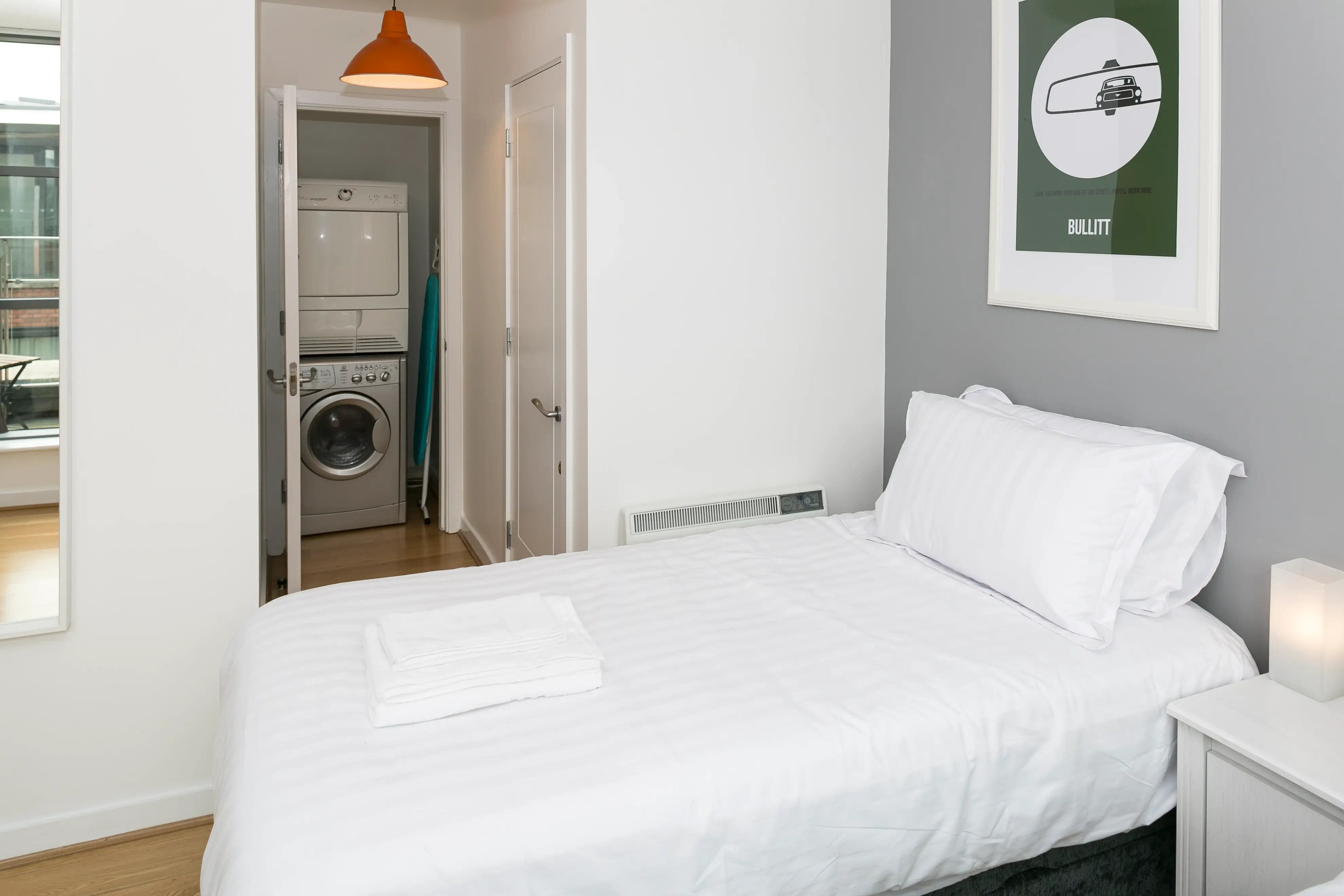 Bedroom with dedicated laundry room