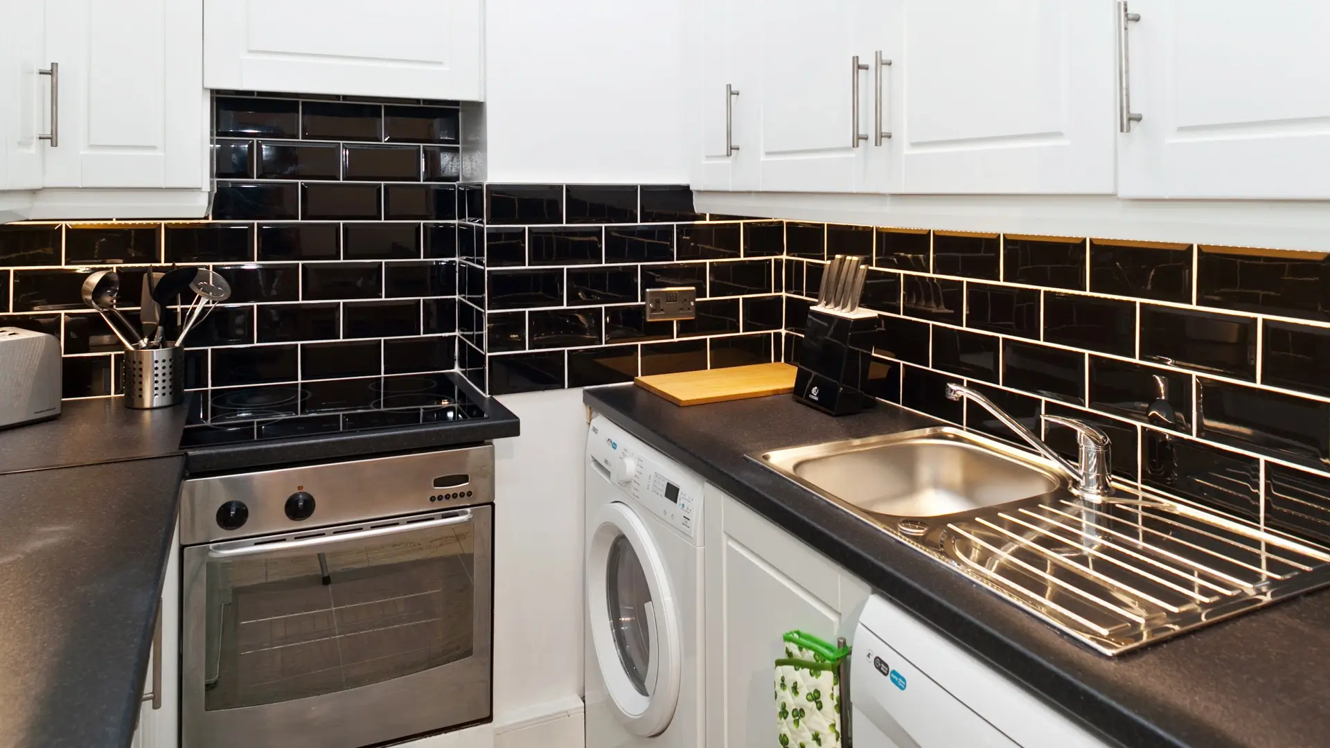 Minimalist galley kitchen with premium furnishings
