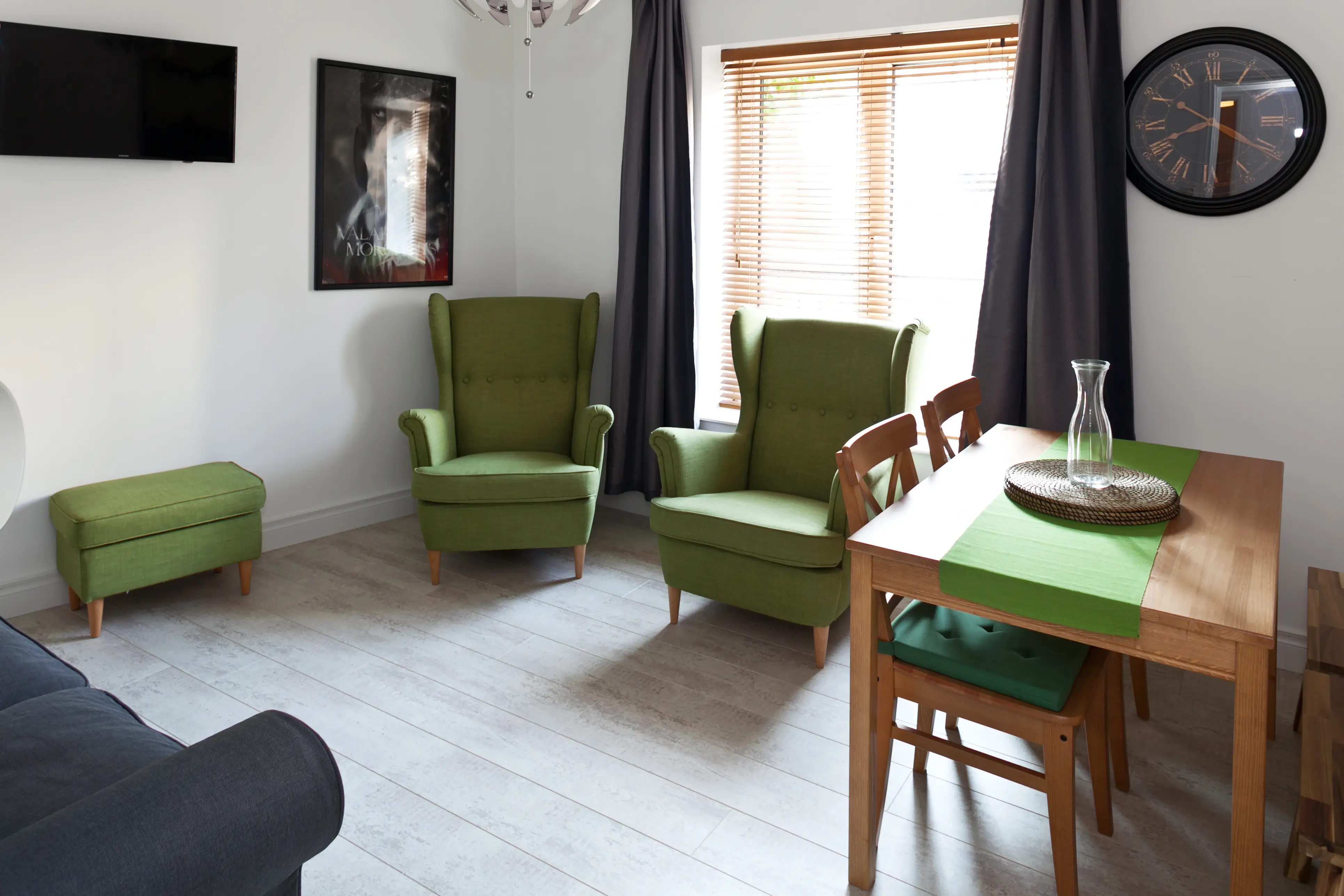 Bright living room with riverfront views